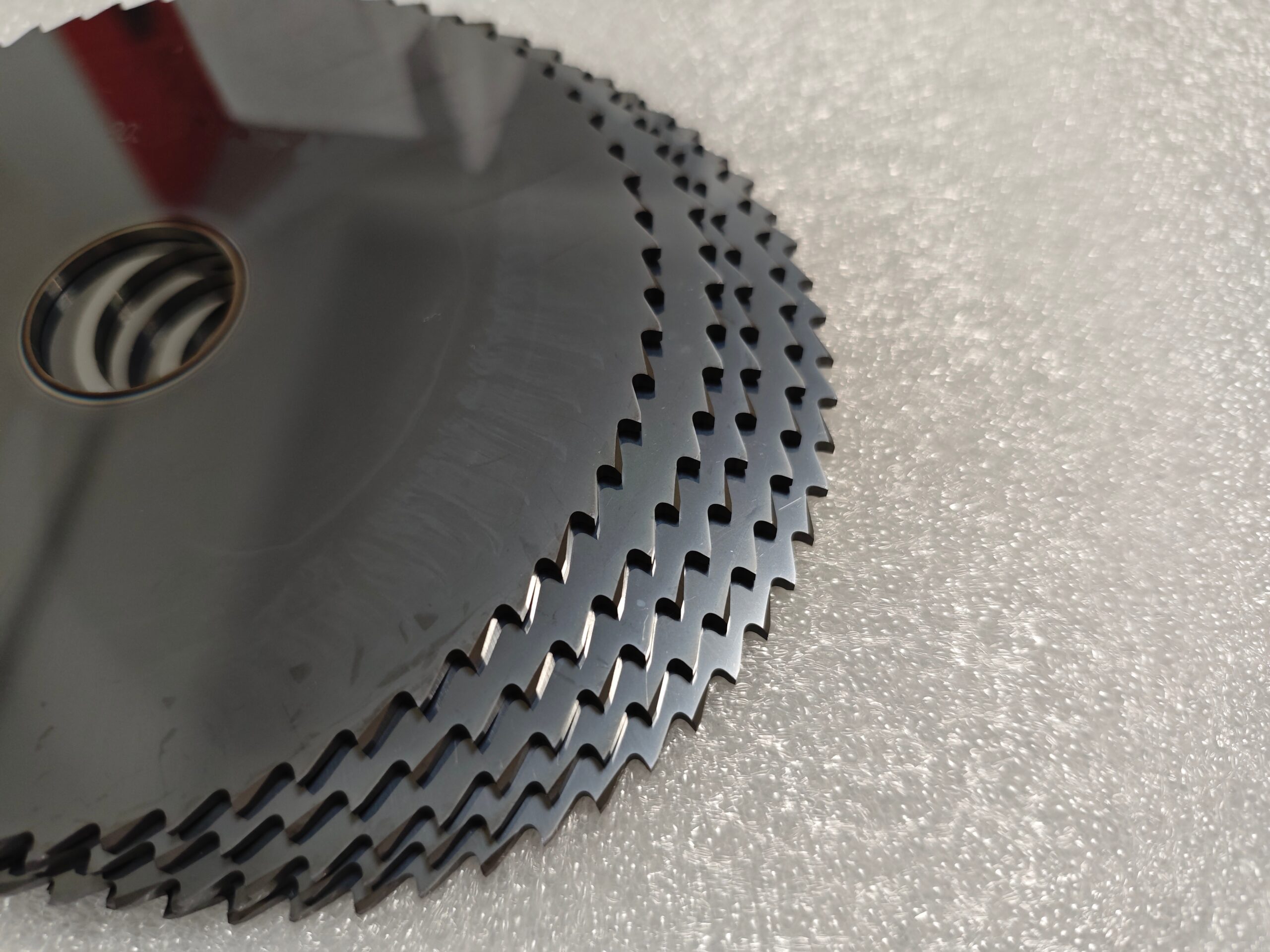 5 inch TiAlN coated solid carbide staggered tooth slitting saw, 1 inch bore, 0.0938 inch thickness, 64T